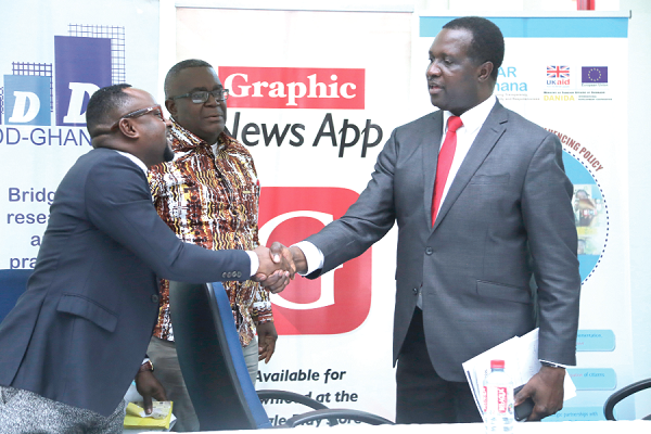 Dr. Yaw Osei Aduwtwum (right),  interacting with Mr Naphtali Kyei-Baffour (left), after the dialogue. With them is Mr Charles Aheto Tsegah, a former Deputy-Director-General of GES. Picture: emmanuel Asamoah Addai