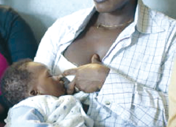 A  mother breastfeeding her baby