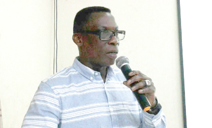 Mr Justice Ofori, NIC Commissioner,  addressing the participants prior to the start of the training programme