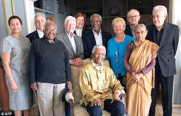  Later in his career, Kofi Annan (centre - standing), joined The Elders Group of Statesmen, including a former South African President, Nelson Mandela (seated), pictured here in 2010