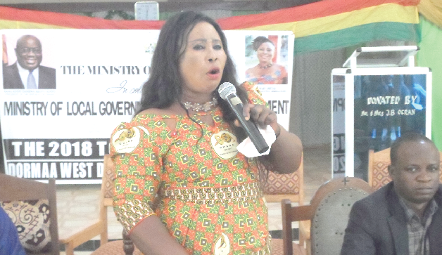 Madam Ameyaa addressing participants in the meeting
