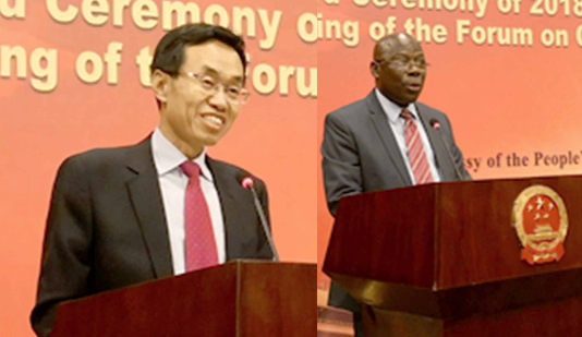 Mr Shi Ting Wang — The Chinese Ambassador to Ghana (right) andMr Enoch Cobbinah — Chief Director at the Education Ministry