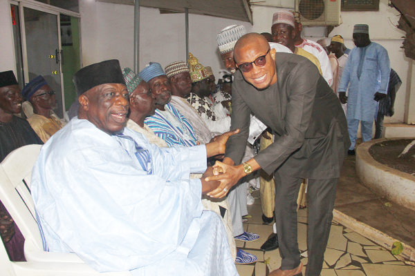 Dr Mustapha Abdul-Hamid (2nd left), the Minister of Inner Cities and Zongo Development, exchanging pleasantries with Alhaji Amadu Baba Seidu (left), the Chief of Madina. Picture: Maxwell Ocloo
