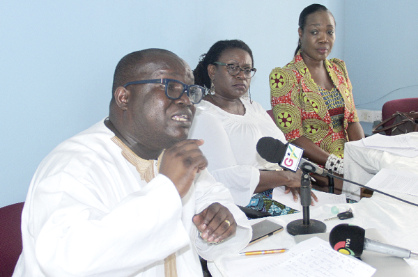 Mr Kenneth Ashigbey (left), the CEO of the Ghana Chamber of Telecommunications (Telecoms Chamber), addressing the media. Those with him are Ms Carol Annang (2nd left), the MD of the New Times Corporation and Ms Gloria Hiadzi (3rd left), Executive Secretary of the Ghana Independent Broadcasters Association. Picture: EDNA ADU-SERWA