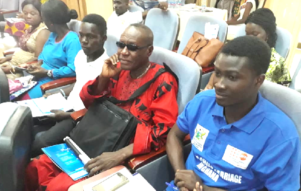 Mr George Frimpong (In dark spectacles) at the dialogue