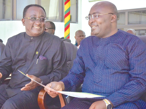 Vice-President Mahamadu Bawumia (right) interacting with Dr Owusu Afriyie Akoto, the Minister of Food and Agriculture, at the ceremony
