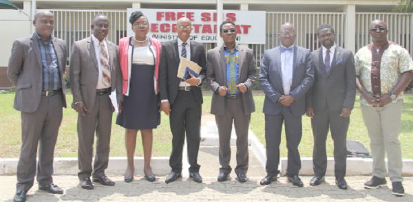 Prof. Yankah (4th right) with members of the delegation and SLTF staff