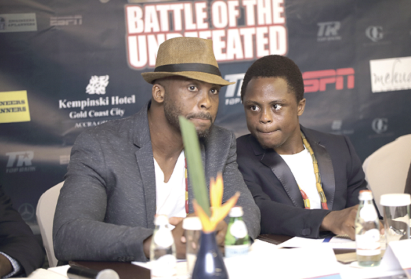 Paul Dogboe (left) is preparing his son Isaac to return to the ring on August 25 to defend his title