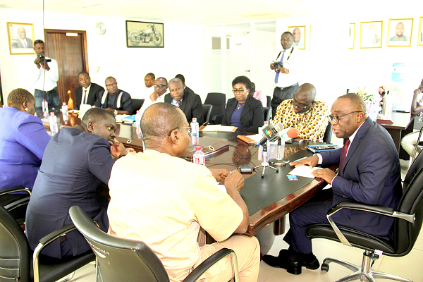 The DVLA Chief Executive, Mr Kwasi Agyeman Busia(arrowed) in a discussion with executives of the GJA