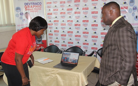 Mrs Abigail Hagan (left) Assistant Advert Sales Manager (Events), GCGL going through the software used for the draw at the Graphic Head Office in Accra. Looking on is Mr Gideon Kyemanu Sarsah (2nd left), Chief Operations Officer, Vokacom.   Picture: EDNA ADU-SERWAA