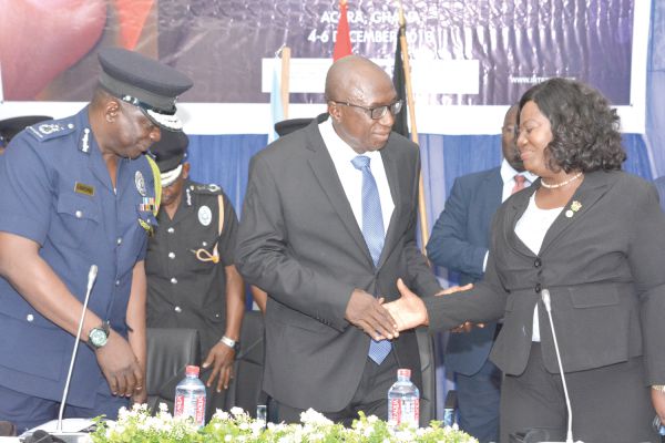 • Mr Ambrose Dery (middle), the Minister of the Interior, interacting with DCOP Maame Yaa Tiwaa Addo-Danquah, the Director General of the CID. With them is Mr David Asante-Apeatu, the IGP, at the meeting