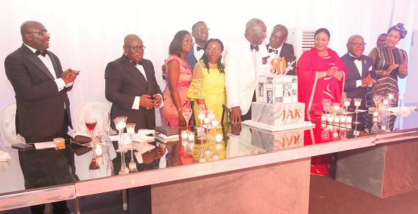 Former President John Kufuor in the company of his children; President Akufo-Addo, Vice-President Dr Bawumia and their spouses and Prof. Mike Oquaye, about to cut the 80th birthday cake. Picture: SAMUEL TEI ADANO
