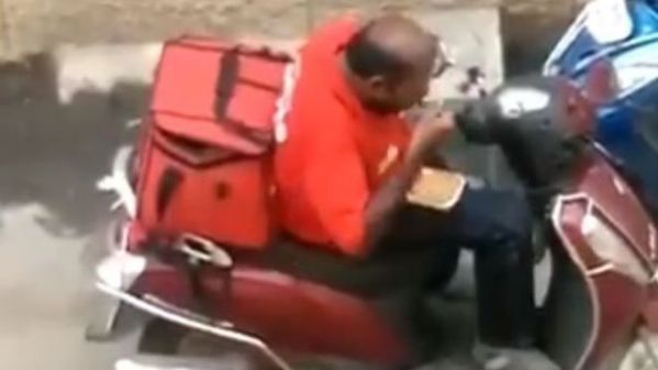 The Zomato delivery driver was filmed eating food from his delivery bag 