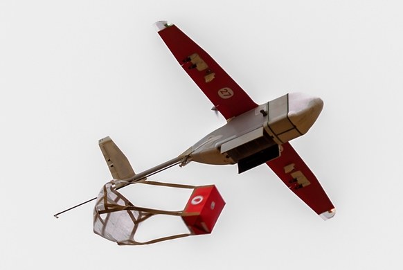 A Zipline drone releases a blood package in southern Rwanda