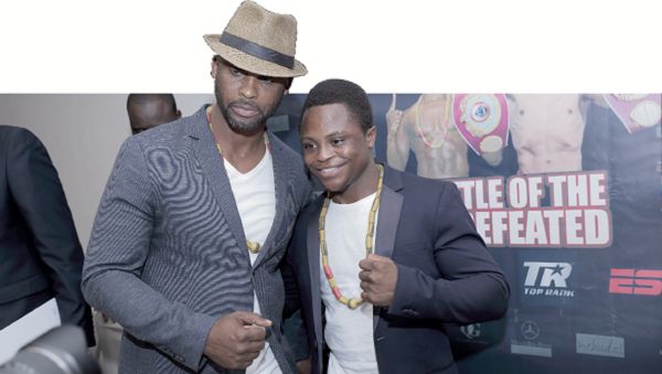  Paul Dogboe (left) and his son, Issac