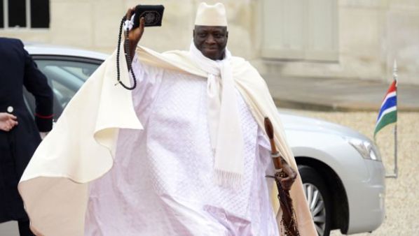 Yahya Jammeh is known for walking around with his trademark prayer beads and a stick 