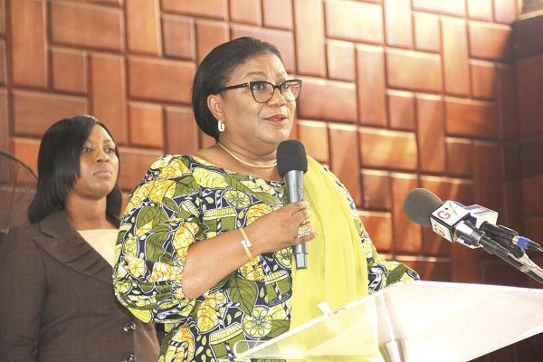 Mrs Rebecca Akufo-Addo (inset), the First Lady, addressing participants at the launch of the girl school dropouts project. Pictures: EDNA ADU-SERWAA