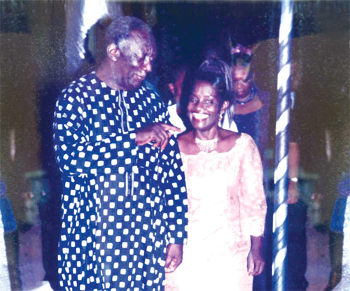 GJA President Ajoa Yeboah-Afari, sharing a joke with President Kufuor, the Guest of Honour, as she ushers him to his seat at the 11th GJA Awards Night in 2006, held at the Press Centre, Accra  Picture: Daniel Lanquaye
