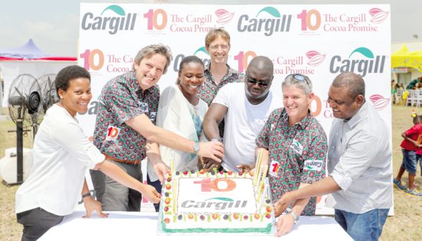  Some Cargill executives cutting the anniversary cake to mark a decade of innovation and sustainability in Ghana. From Left: Ms Ama Tanoh - Communications Manager, Cargill West Africa; Mr Filip Buggenhout – Managing Director-Cocoa, Cargill Cocoa & Chocolate; Mrs Ama Mintah - Head of Finance, Cargill Ghana, Mr Michiel Jehee – Operations Manager, Cargill Ghana (M); Mr Smart Darkwah - Plant Manager, Cargill Ghana; Mr Pieter Reichert - Managing Director, Cargill Ghana and Mr Francis Yohuno - Regional Human Resources Manager, Cargill Ghana