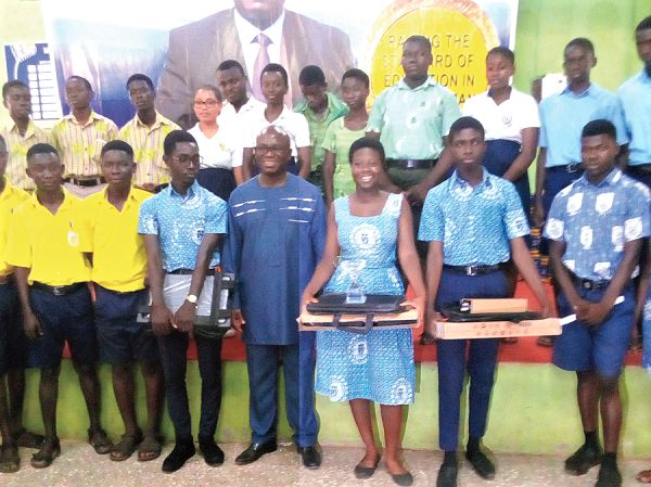 Mr Paul Ansah, (middle front row) a Director, Ministry of Transport, with the contestants from all the participating schools