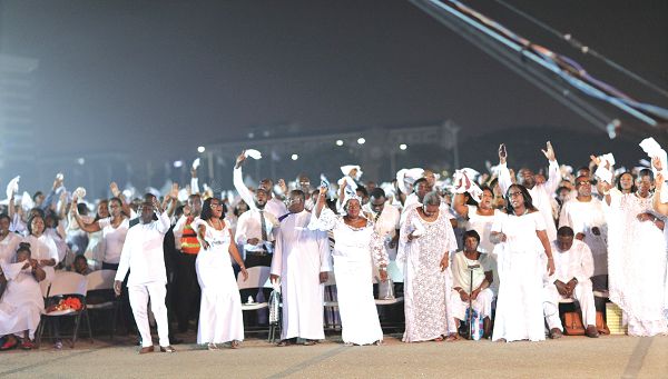 Some members of the ICGC, singing praises to the glory of God during the crossover service