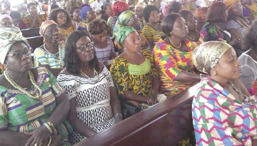 The congregation in their traditional outfits