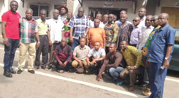 Mr Osei Assibey Antwi (arrowed), the KMA Chief Executive, with the representatives of transport unions who attended the meeting