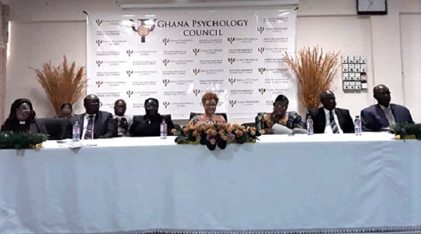 The Registrar of the GPC, Dr Dinah Baah-Odoom (left) and council members seated at the induction ceremony