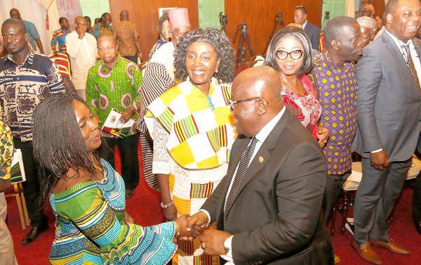President Nana Addo Dankwa Akufo-Addo exchanging pleasantries with some members of the National Development Planning Commission. Picture: Samuel tei adano