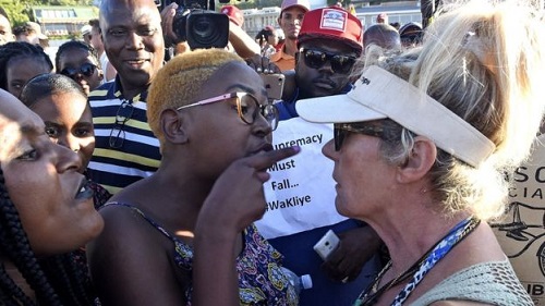 Animal rights activists clashed with protesters who sacrificed a sheep on the beach