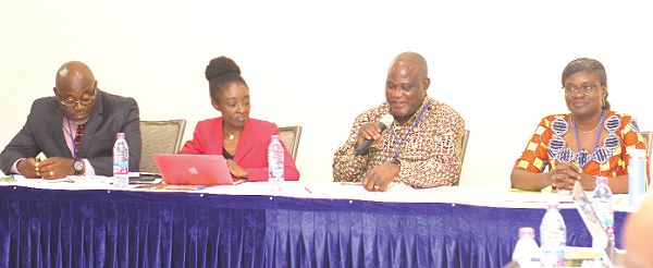 Mr John Pwamang (3rd left), Ag Executive Director, EPA, speaking at the forum. Those with him are Mr Ebenezer Appiah Sampong (left), Deputy Executive Director, EPA; Ms Vita Owuasanya (2nd left), representative of DOALOS, and Ms Joan Akrofi (right), representative of the UN Environment. Picture: NII MARTEY M. BOTCHWAY