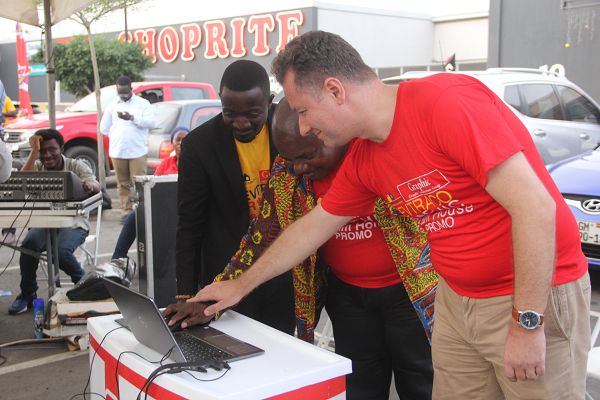  Mr Ransford Tetteh (middle), the Editor of the Daily Graphic, and Mr Jorge Osorio (right), Group Sales and Marketing Director, Devtraco Company Limited, clicking a button to pick the winner of the Devtraco/Graphic Dream Home Promo. Picture: Maxwell Ocloo