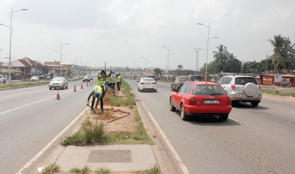 Some workers preparing the ground for construction work to begin