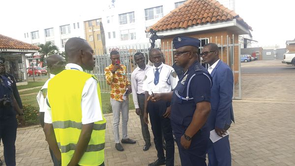 ASP Kwara Dompre (right) interacting with some of the security personnel from WESTEC Security Service