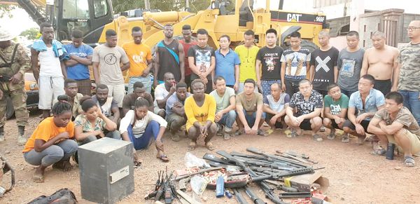 Some of the  Chinese arrested by the Operation Vanguard in the Kobro Forest Reserve in the Amansie Central District