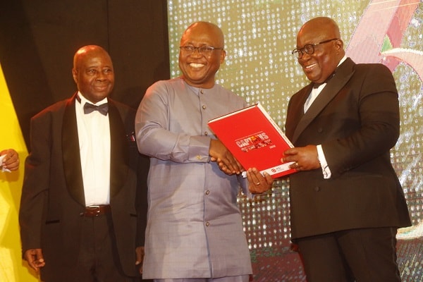 President Akufo-Addo being presented with a commemorative book on AGI@60 (1)