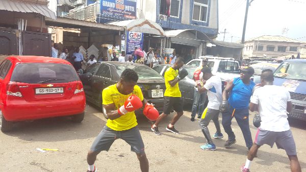 Patrick Allotey (left) and other boxers at the roadshow last Friday