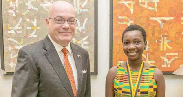 Lily Tugbah poses with the US Ambassador, Mr Robert Jackson. Who would she hand over to?
