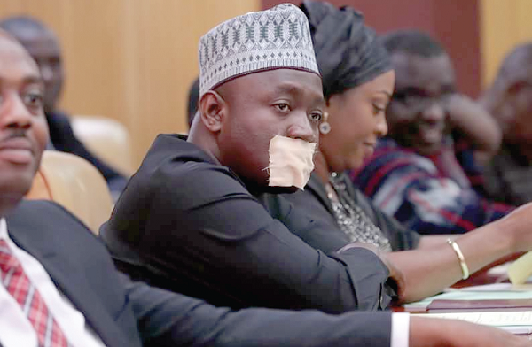 Mr Suhuyini Alhassan with his mouth plastered during the second State of the Nation Address by President Akufo-Addo last Thursday