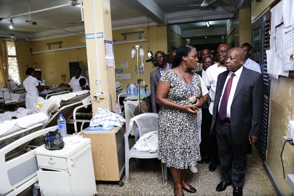 Dr Kakra Condua (left) briefing Mr Kwaku Agyemang Manu, the Minister of Health, about the emergency unit during his visit