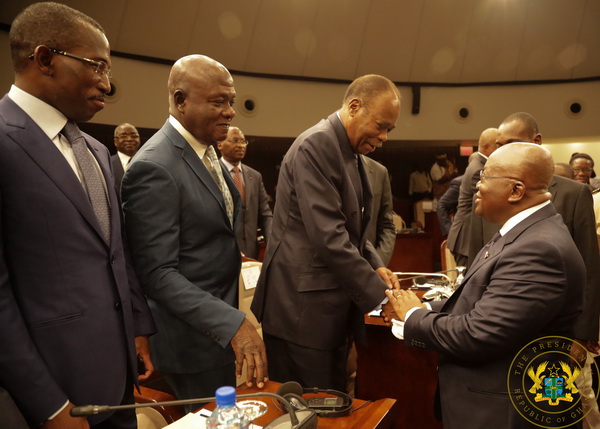 President Akufo-Addo exchanging pleasantries with one of the leaders of Togo's Coalition of 14 opposition parties