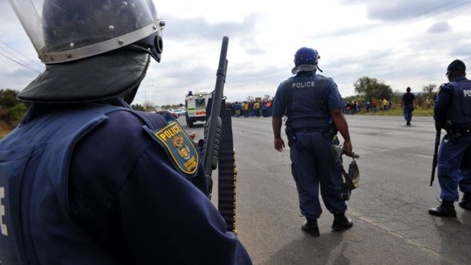 The attackers took 10 firearms and a police van from the station