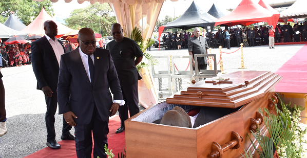 President Akufo Addo filing past the casket containing the mortal remains of the late Professor Francis Kofi Allotey. Pictures: GABRIEL AHIABOR