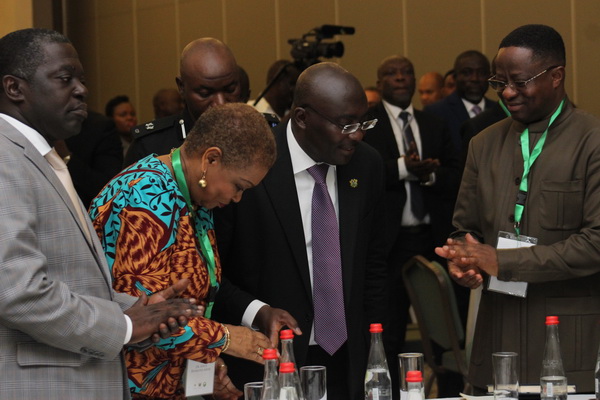 Dr Mahamudu Bawumia (2nd right) being  welcomed to the forum by Mr John Peter Amewu (right); his deputy, Mr Benito Owusu Bio, and  Dr Joyce Aryee (2nd left)