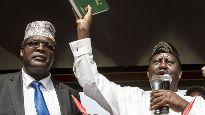 Miguna Miguna (L) played a key role in the "inauguration" of Raila Odinga (R)