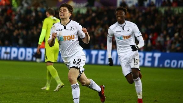 Swansea midfielder Daniel James celebrates his strike against Notts County