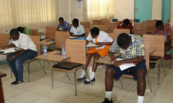 shortlisted students writing their essay