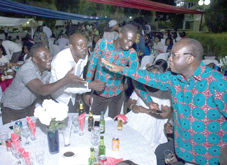 Fredie Blay exchanging pleasanttries wiht some party supporters