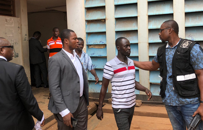 A section of the accused being led away after the committal processes