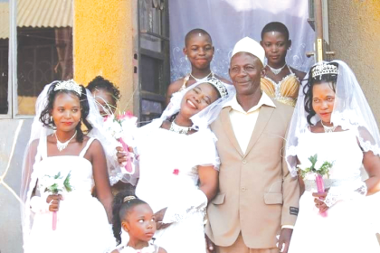Mohammed Semanda together with his three wives